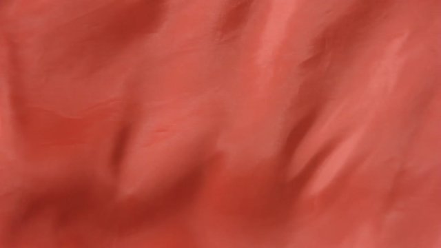 red cloth lye swaying in the wind, closeup