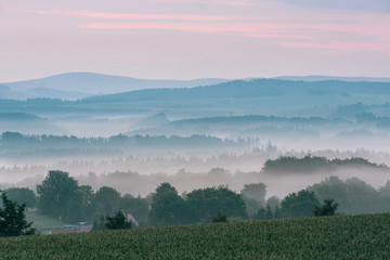 morning fog before sunrise in mountains of Saxony