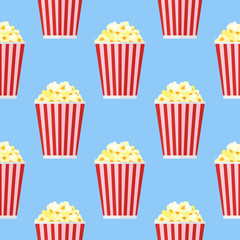 Seamless pattern with popcorn on blue background. Vector texture.