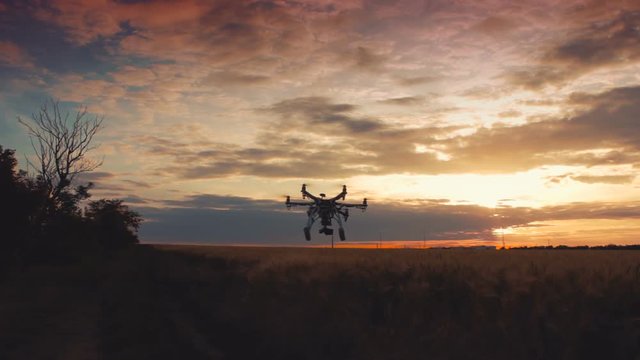 Custom drone hexacopter flies in the sky