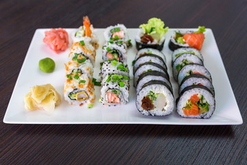 Sushi set with chopsticks on the plate