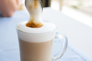 Cup of Cappuccino Coffee with a delicious crema.
