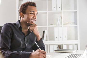Happy man working on project