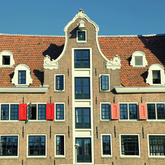 Fototapeta na wymiar Traditional dutch medieval building in Amsterdam, Netherlands