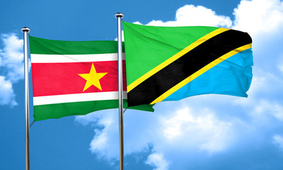 Suriname flag with Tanzania flag, 3D rendering
