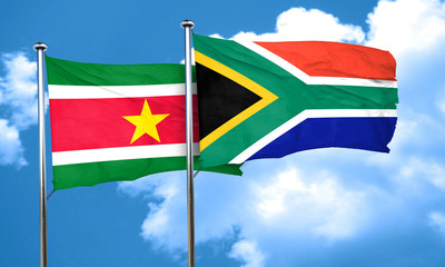 Suriname flag with South Africa flag, 3D rendering