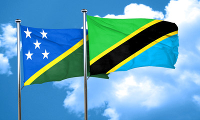 Solomon islands flag with Tanzania flag, 3D rendering
