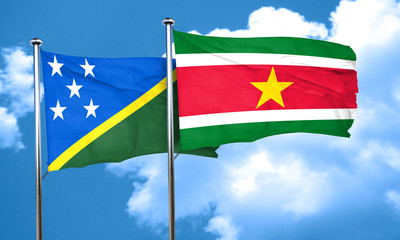 Solomon islands flag with Suriname flag, 3D rendering