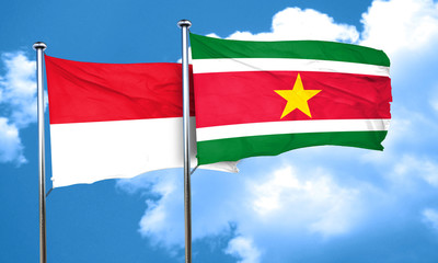 Obraz premium monaco flag with Suriname flag, 3D rendering