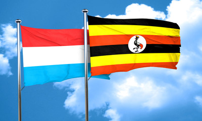 Luxembourg flag with Uganda flag, 3D rendering