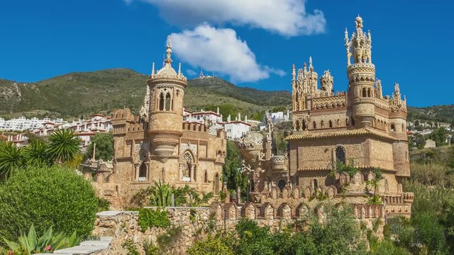 Castillo de Colomares in 4K with moving clouds. It is a monument similar to a fairytale castle, dedicated to Christopher Columbus. Benalmadena, near Malaga in Andalusia, Spain.
