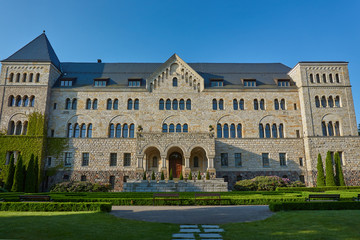 Fototapeta premium Park and imperial castle with towers in Poznan.