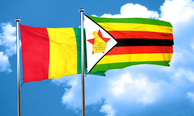 Guinea flag with Zimbabwe flag, 3D rendering