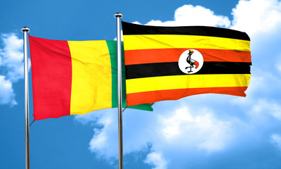 Guinea flag with Uganda flag, 3D rendering