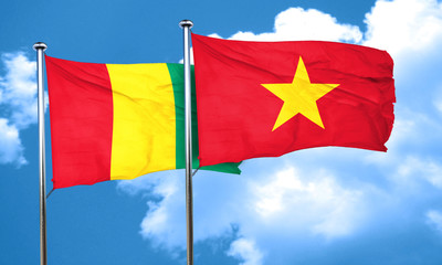 Guinea flag with Vietnam flag, 3D rendering