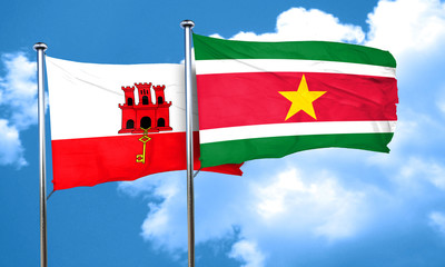 gibraltar flag with Suriname flag, 3D rendering