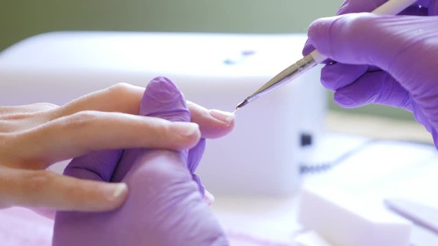Trendy French manicure professional painting done in salon 4K 2160p 30fps UltraHD footage - Applying white paint on French finger tips 4K 3840X2160 UHD video