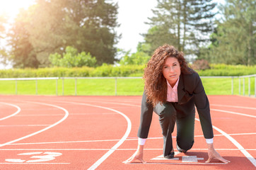 Confident businesswoman in the starter position