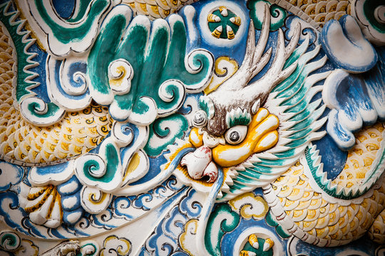 Dragon stucco on wall in chinese temple