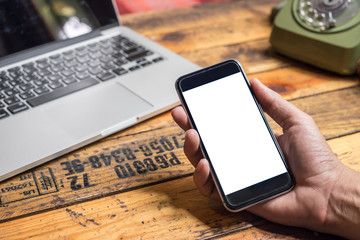 Man's hands using smart phone