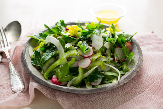 Spring herb salad with meyer lemon dressing