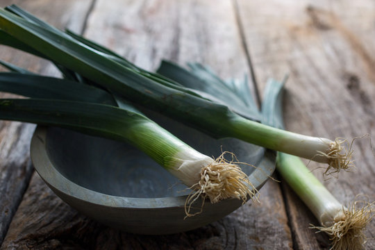 Fresh leeks in bowl