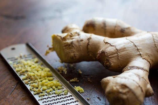 Fresh root ginger and grater