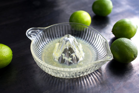 Fresh Limes And Juicer