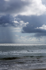 Pacific ocean during a storm. Beach landscape in the U.S. in bad weather. The ocean and waves during strong winds in United States, Santa Monica.