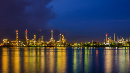Oil refinery at twilight , Chao Phraya river, Thailand