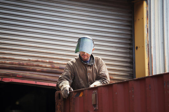 Man working with metal