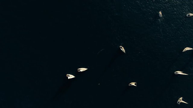Yachts on water aerial view from above