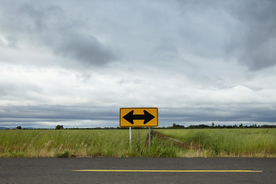 Landscape with road sign