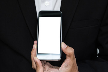 Mobile phone on businessman's hand, with copy space on screen