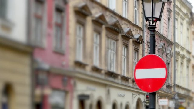 4K Slow Zoom In, Wrong Way Sign, European City Street and Buildings