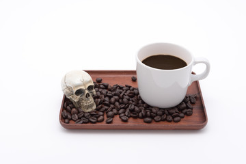 Coffee cup and beans on wooden tray isolate on white background