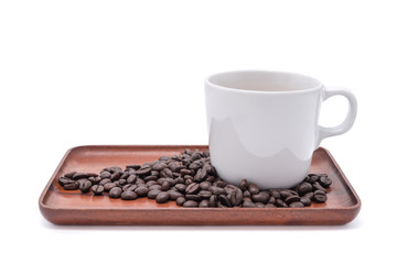 Coffee cup and beans on wooden tray isolate on white background