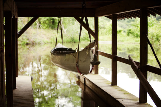 Canoe hanging in boat house