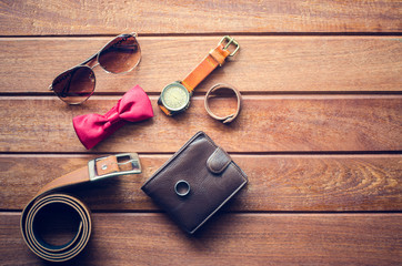 acceseries for men on the wooden floor