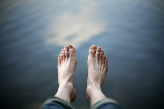 Bare feet above water