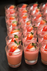  strawberry  panacotta cream dessert on the table