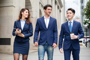 Group of business people discuss at outdoor