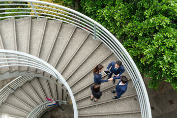 Top view of business people standing at step