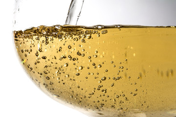 Stream of wine being pouring into a glass closeup, wine, splashing, splash, bubbles, fizz
