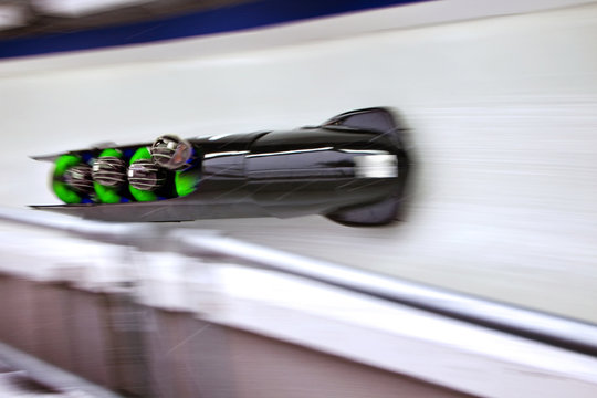 High angle view of bobsleigh team on track