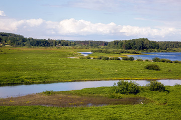 Fototapeta na wymiar beautiful day landscape with a lake
