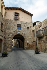 Fototapeta na wymiar Portal de les Verges medieval wall of Santpedor