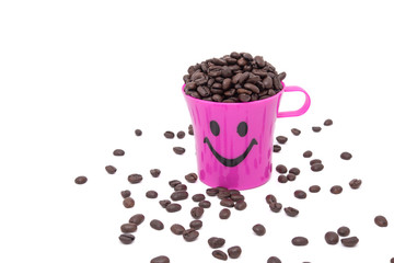 Coffee beans in pink cup