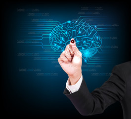 Businessman hand writing and drawing brain on a touch screen interface