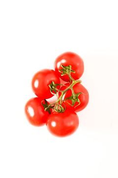 Top view of fresh tomatoes, isolated on white background